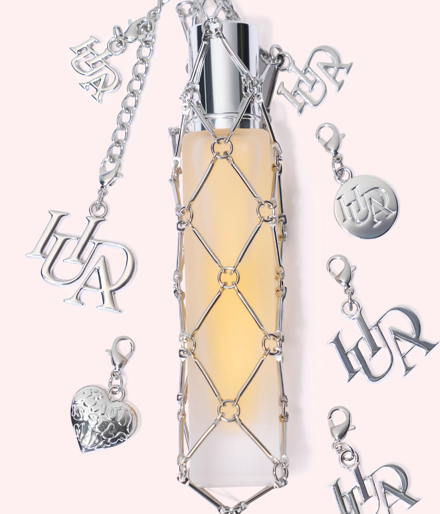 TRAVEL SPRAY FRAGRANCE HOLDER WITH CHARMS - US 3462